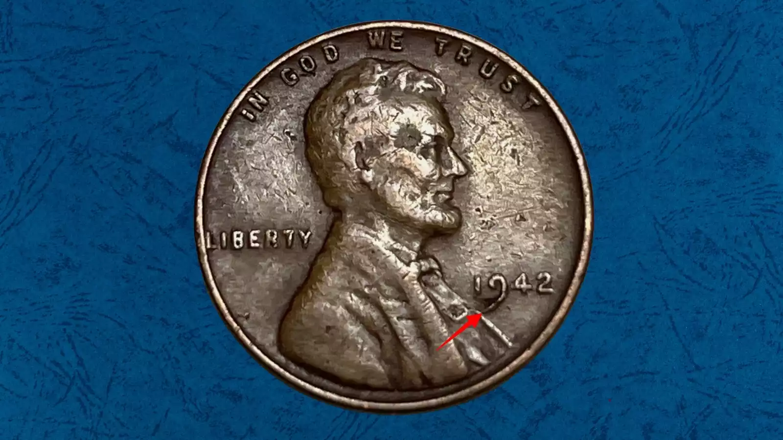 1942 wheat penny die crack error showing raised line across design — or cud error showing raised blob at rim from broken die piece